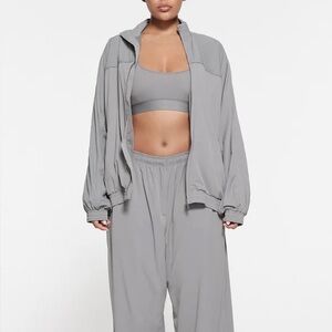 SKIMS Gray Woven Nylon Jacket (part of a set)